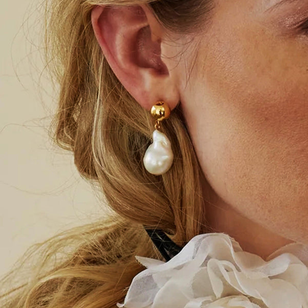 Aretes colgantes de perla