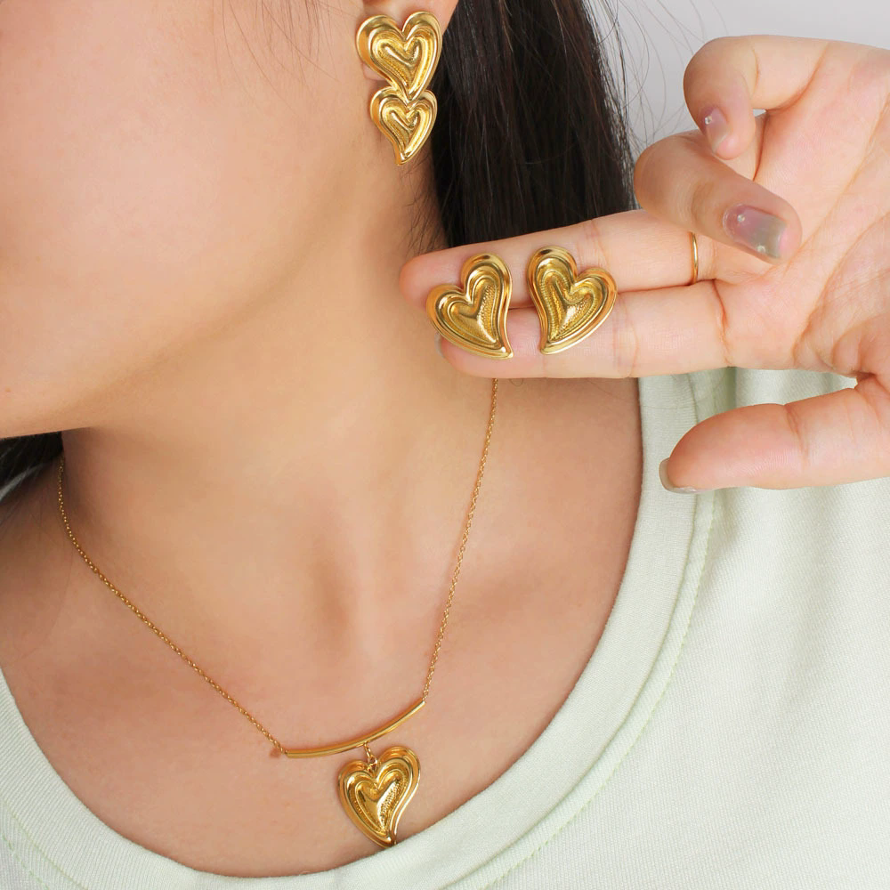 Aretes dorados de corazón - Dressygt