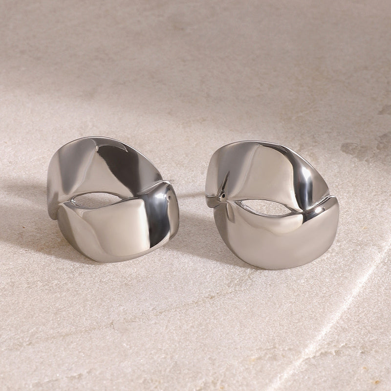Aretes con abertura entrelazada