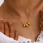 Collar con dije dorado - Dressygt
