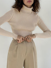Sweater de cuello alto