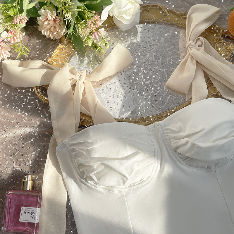 Blusa blanca de tirantes con lazos