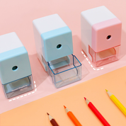 Sacapuntas de manivela con depósito