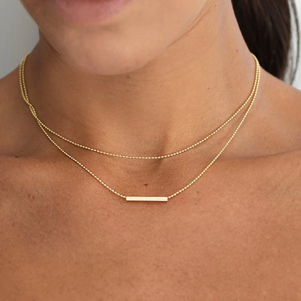 Collar dorado doble
