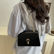 Mini bolso con detalles dorados