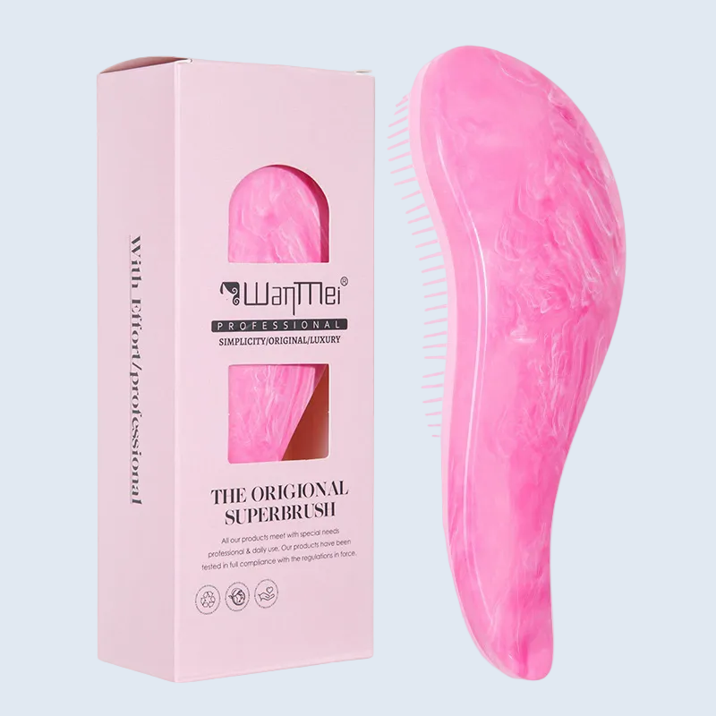 Cepillo desenredante ergonómico