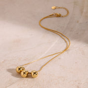 Collar con dije dorado - Dressygt