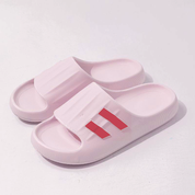Sandalias tipo slide con líneas