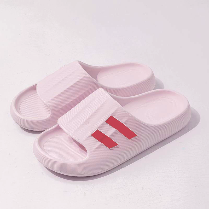 Sandalias tipo slide con líneas