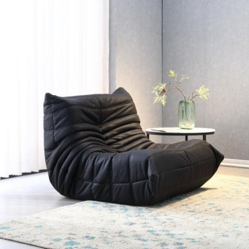 Sillón individual bajo acolchado