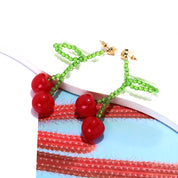 Aretes largos de cerezas