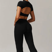 Conjunto deportivo flare con crop top manga corta - Dressygt