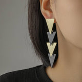 Aretes largos minimalistas