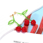 Aretes largos de cerezas