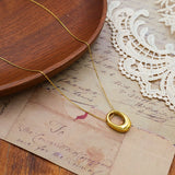 Collar con dije circular