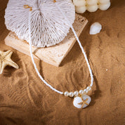 Collar con perlas y estrella de mar