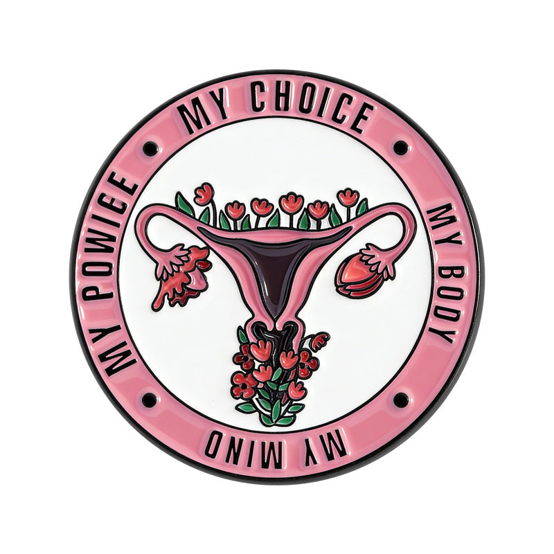 Pin metálico feminista de útero