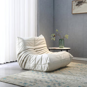Sillón individual bajo acolchado