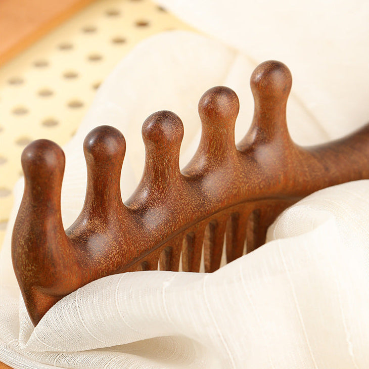 Peine masajeador de madera