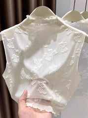 Top semi transparente con cuello alto - Dressygt