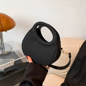 Bolso circular de fieltro