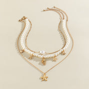 Collar multicapa de perlas con dijes marinos - Dressygt