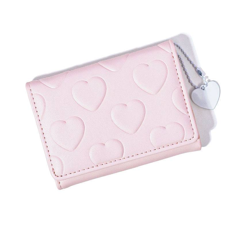 Billetera con diseños de corazones