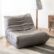 Sillón individual bajo acolchado