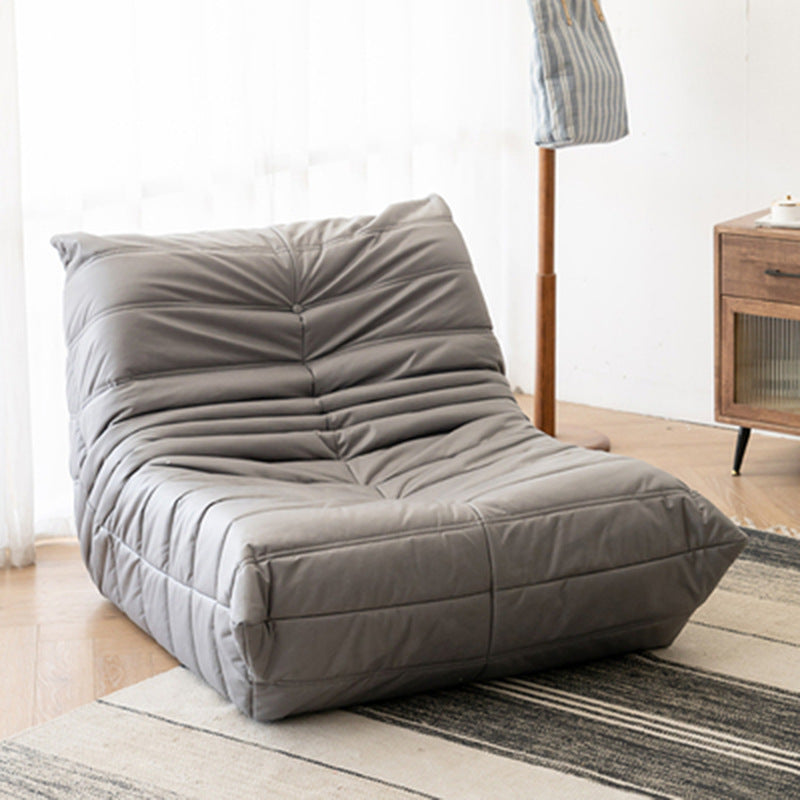 Sillón individual bajo acolchado