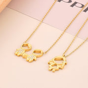 Collar con dije de niños dorado - Dressygt