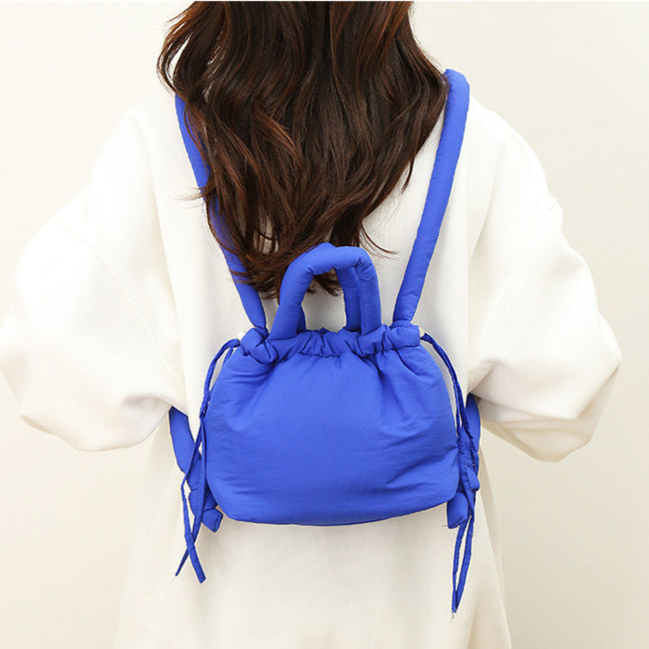 Bolso cruzado estilo puffer