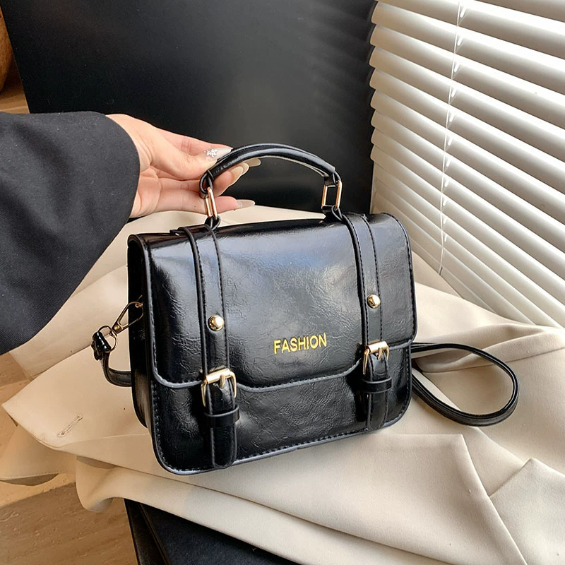 Bolso casual de mano con correa larga