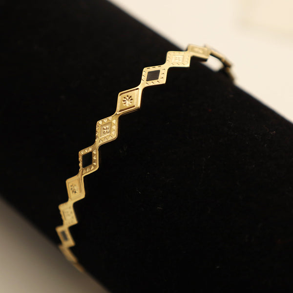 Pulsera dorada de rombos