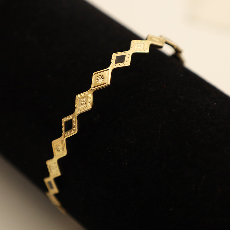 Pulsera dorada de rombos