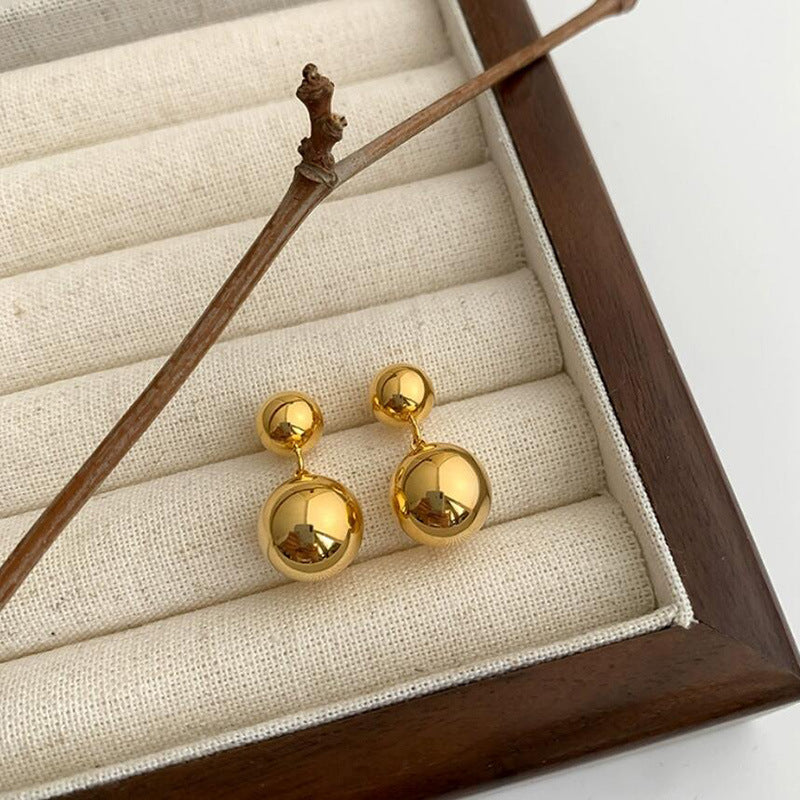 Aretes con diseño de esfera