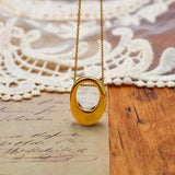 Collar con dije circular
