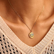 Collar con dije de ojo turco