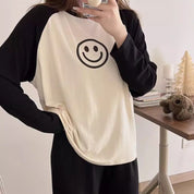 Pijama de 2 piezas de manga larga con carita feliz