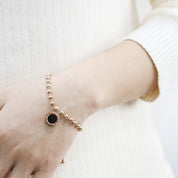 Pulsera con dije circular - Dressygt