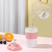 Vaso de vidrio y silicona con tapadera
