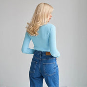 Blusa de cuello alto y manga larga
