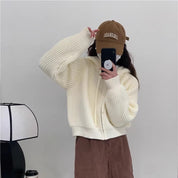 Suéter con capucha y zipper