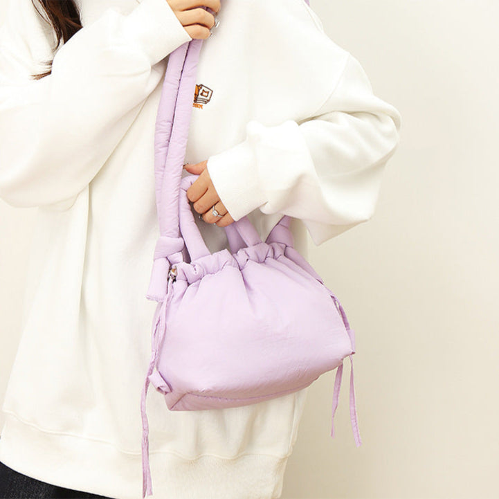 Bolso cruzado estilo puffer