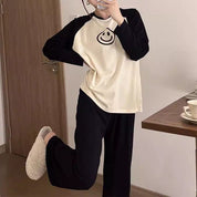 Pijama de 2 piezas de manga larga con carita feliz