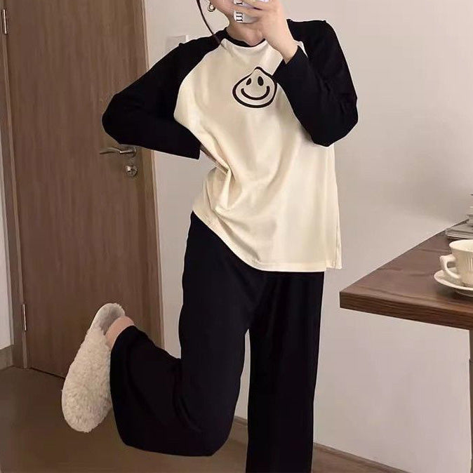 Pijama de 2 piezas de manga larga con carita feliz