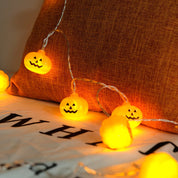 Tira de luces con forma de calabazas