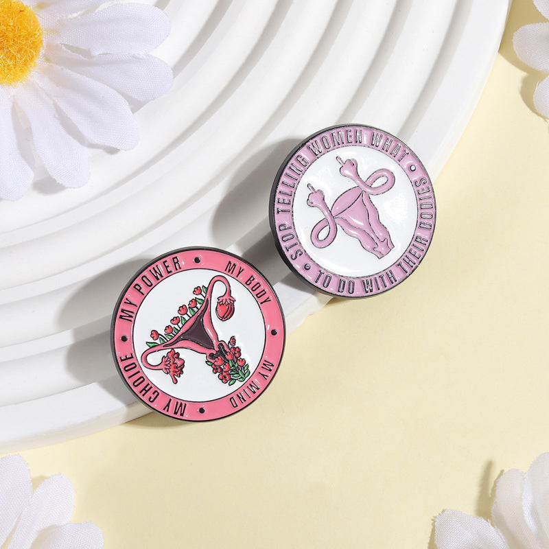 Pin metálico feminista de útero