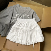 Mini falda ballon con moños