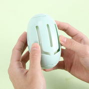 Quita pelusas tipo cápsula