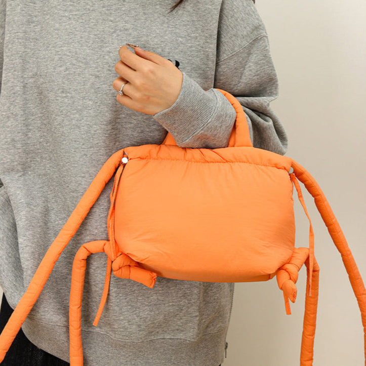 Bolso cruzado estilo puffer